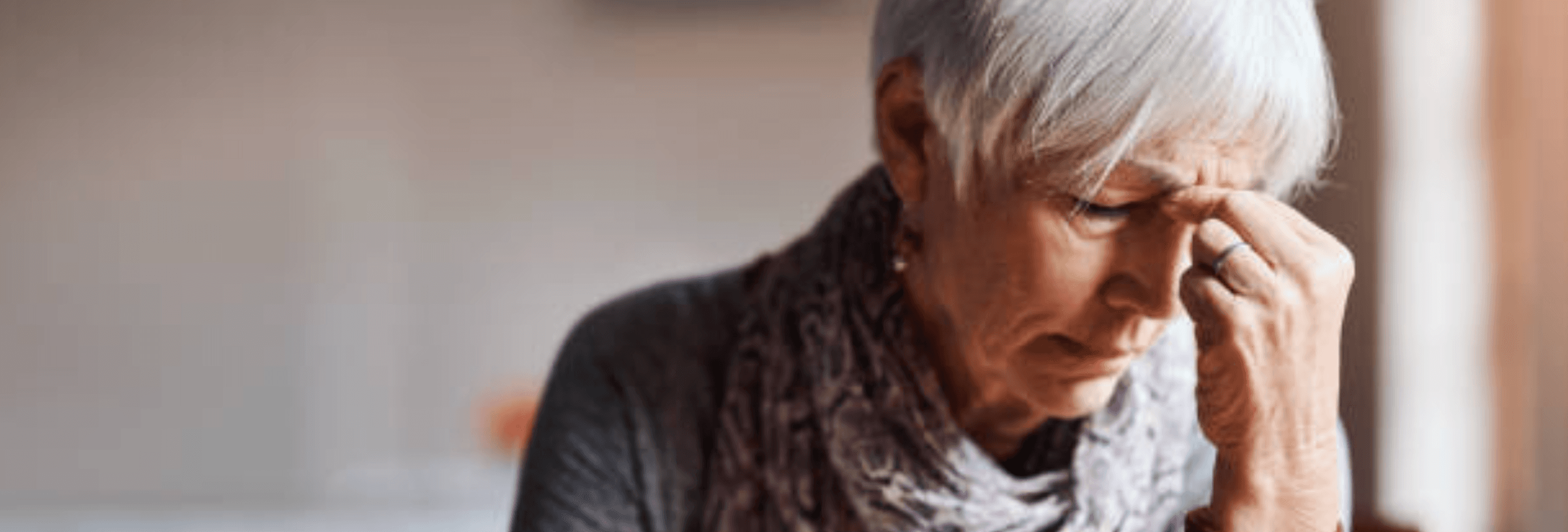 Person experiencing loss looking tired and overwhelmed